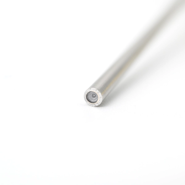 JIACHENG rigid therapeutic otoscope E8027A 27mm 0 distal tip close-up showing forward-facing lens surface and stainless steel shaft end JIACHENG rigid therapeutic otoscope E8027A 27mm 0 distal tip close-up showing forward-facing lens surface and stainless steel shaft end